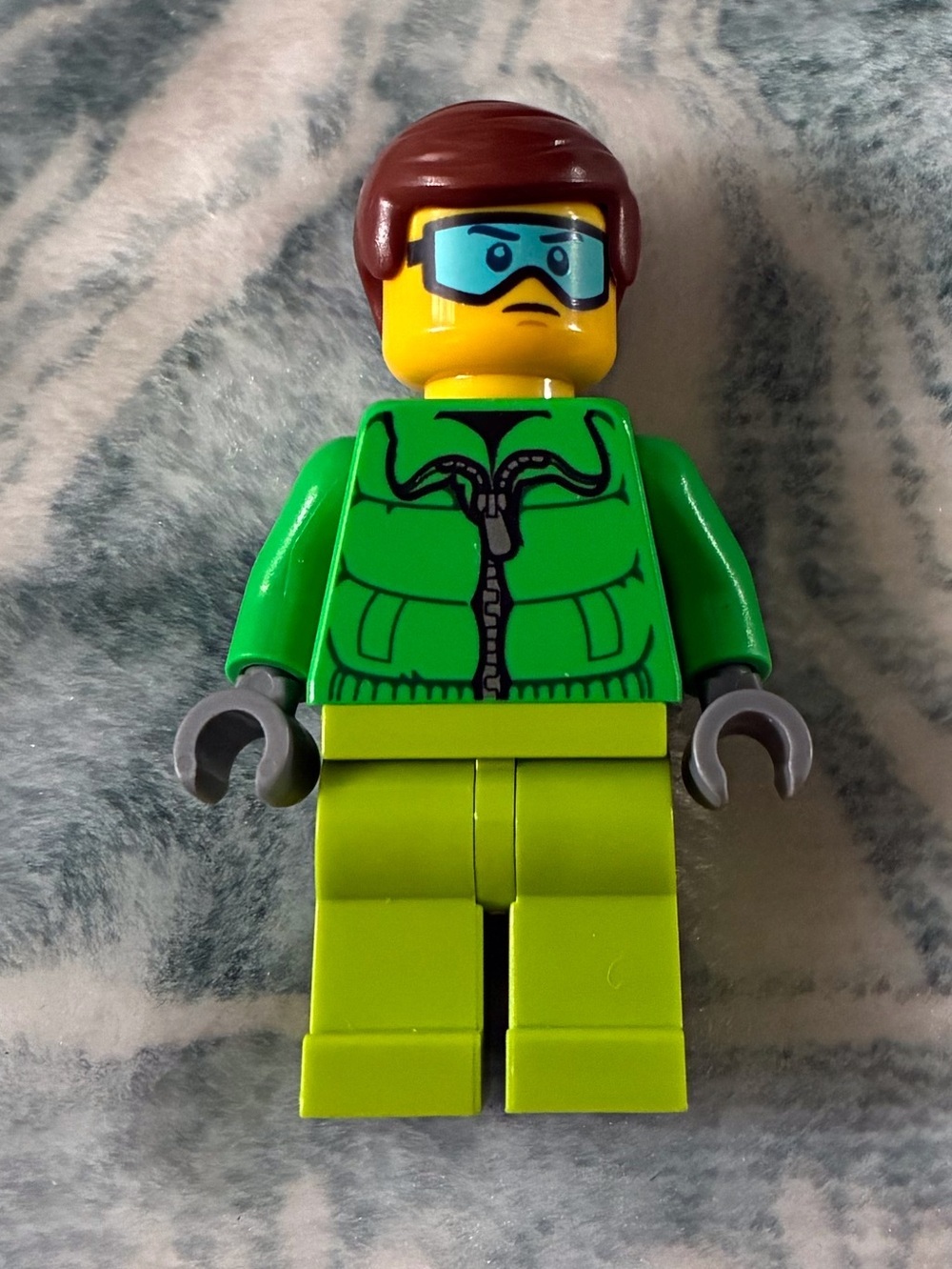 Green LEGO Minifigure with Lime Legs and Blue Goggles
